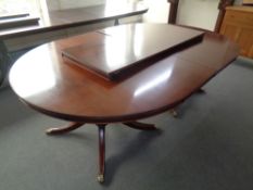 A Shaw of London D-end twin pedestal dining table with leaf,