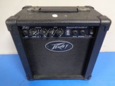 A Peavey backstage II amplifier with lead