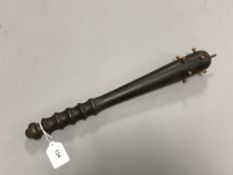 A reproduction wooden trench club