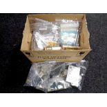 A box of unboxed and boxed military modelling kits, decals,