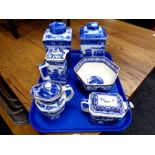 A tray of Ringtons blue and white lidded caddies, jugs,