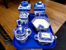 A tray of Ringtons blue and white lidded caddies, jugs,