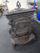 An antique cast iron French stove