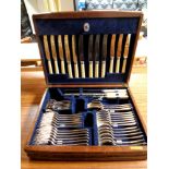 An oak cased canteen of plated cutlery by Mappin and Webb