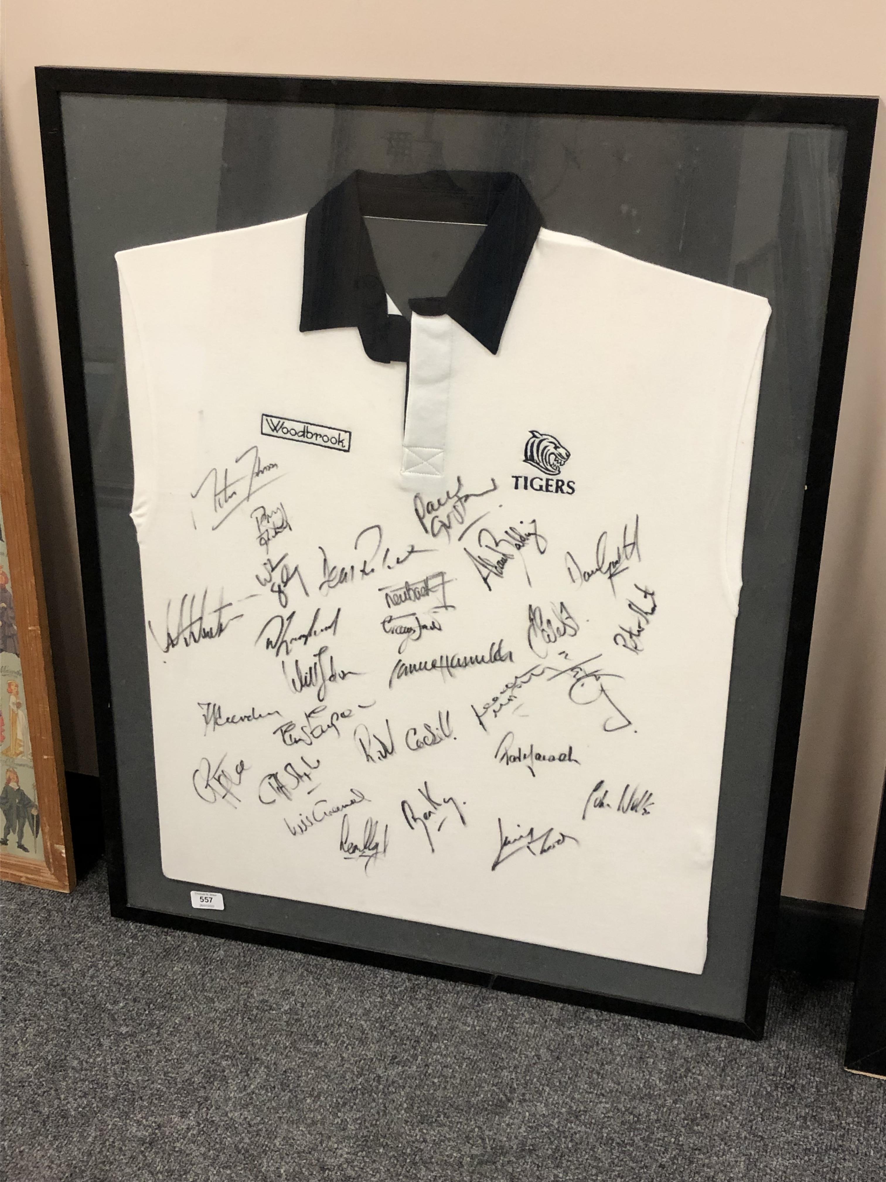 A framed signed rugby shirt : Leicester Tigers