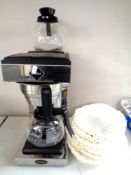 A Rioba coffee machine with two coffee pots and filters