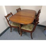 A mahogany Queen Anne style gateleg table and six Regency style dining chairs