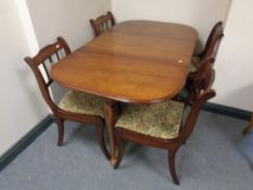 A mahogany Queen Anne style gateleg table and six Regency style dining chairs