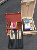 Two artist's boxes containing pencils,