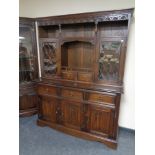 A Jaycee furniture carved oak dresser fitted with drawers