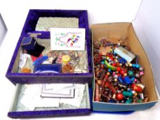 A velvet jewellery box together with a box containing a costume jewellery,