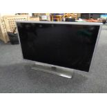 An LG 32" LCD TV with lead no remote