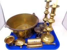 A tray containing antique and later brass ware to include pair of candlesticks,