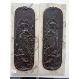 A pair of Art Nouveau style bronzed plaques