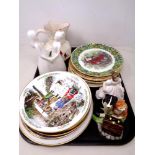 A tray of Royal Albert Christmas plates, Coalport Moments figure, Royal Doulton figure Amanda,