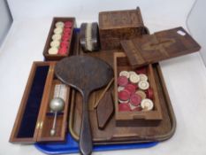 A tray of puzzle box and further box containing bone draughts counters, Edwardian serving tray,
