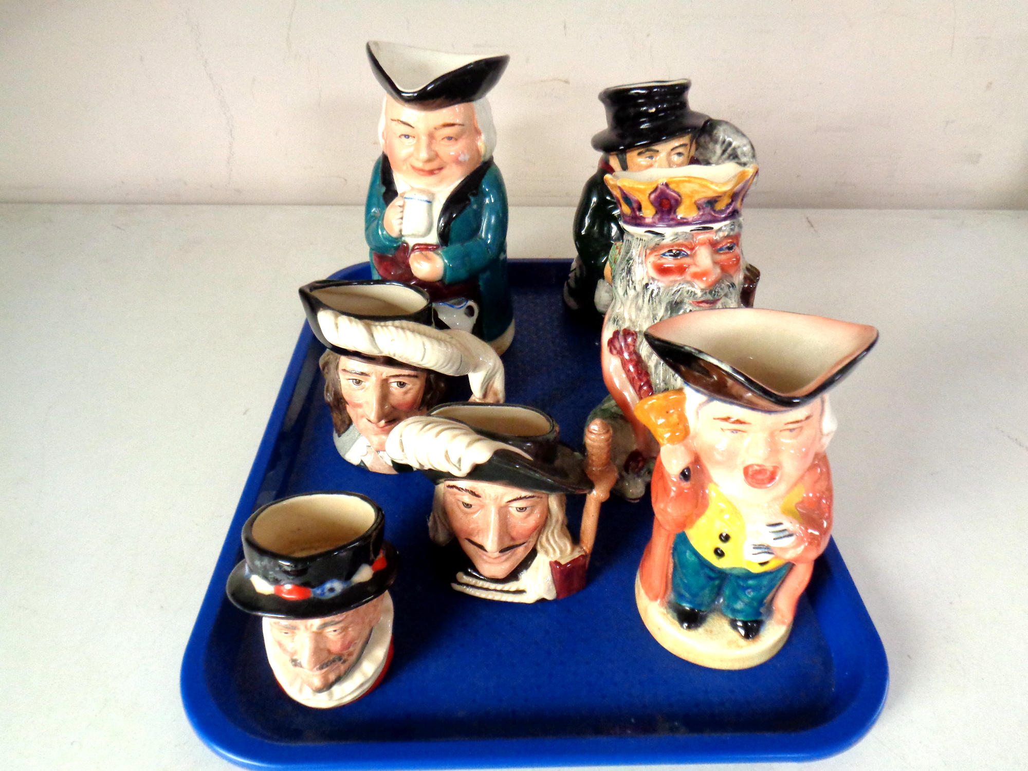 A tray of Toby and character jugs including Royal Doulton,