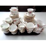 A tray of Royal Albert Moss Rose tea and dinner china