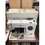 A Pfaff 122 electric sewing machine with foot pedal, cased.