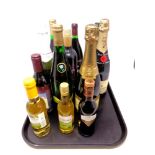 A tray of various alcohol, California Chardonnay, Moet and Chandon champagne,