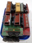 A tray of vintage Hornby trains, tin plated rolling stock, low sided wagons, brake vans,