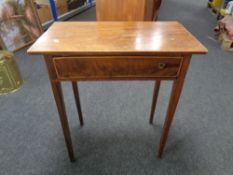 A Victorian inlaid mahogany occasional table fitted with a drawer