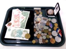 A tray containing pre decimal coins, English and American bank notes,