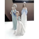 Three Nao figures of girls