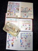 A box of three albums of stamps,