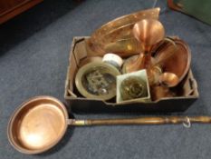 A box of metal ware, brass and copper jug, shield, bed warming pan,