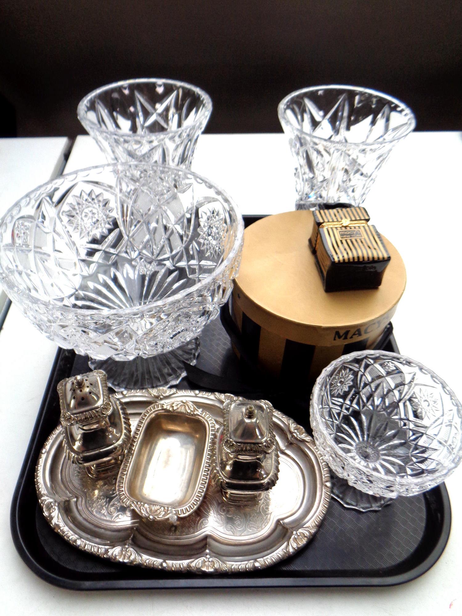 A tray of silver plated salt and pepper sifters, lead crystal bowls and vases,