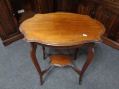 A 19th century shaped mahogany occasional table