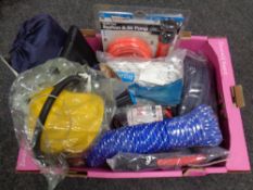 A box of assorted rope, elastic strapping, yellow stone air bed,