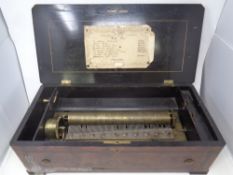 A 19th century walnut cylinder music box