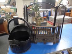 A three-way folding spark guard together with a coal bucket and a cast iron fire front with grate.