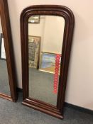 A continental mahogany framed mirror 134 cm x 61 cm