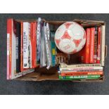 A box of signed football by Manchester United,