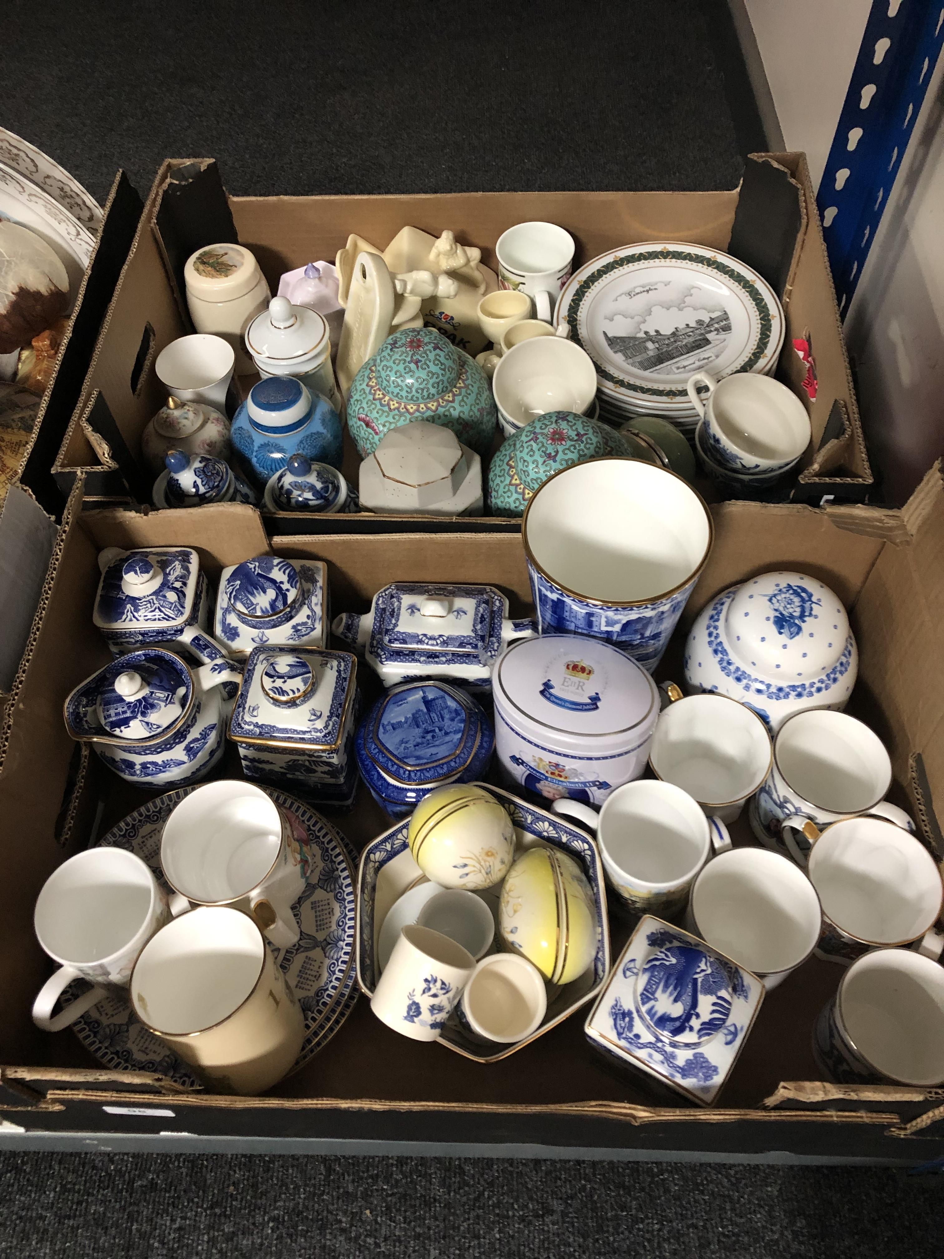 Two boxes of Ringtons blue and white ceramics, lidded jars, caddy,