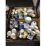 Two boxes of Ringtons blue and white ceramics, lidded jars, caddy,