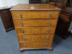 A walnut five drawer chest together with barley twist occasional table