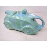 A Sadler teapot in the form of a racing car