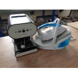 A Delta steam generator iron together with a Next coffee machine