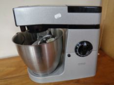 A Kenwood Major food mixer with accessories