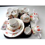 Approximately 39 pieces of Crownford Virginia Strawberry pattern tea and dinner china made