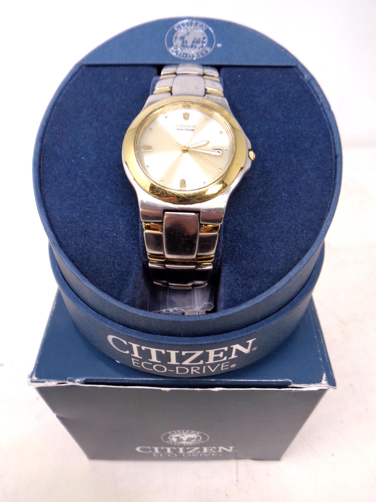 A Citizen gold plated and stainless steel wrist watch in box