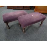 A pair of contemporary footstools in purple fabric on mahogany bobbin legs