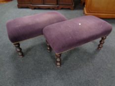 A pair of contemporary footstools in purple fabric on mahogany bobbin legs