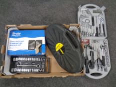A box of cased ratchet, combination wrench set,