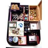 A tray of costume jewellery, silver dress rings,