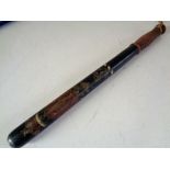 A turned wooden police truncheon with later decoration